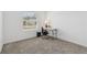Carpeted bedroom with window, great for a home office or guest room at 6139 Claystone Way, Mount Dora, FL 32757