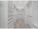 Ample shelving in the walk-in closet provides plenty of room for organization at 6139 Claystone Way, Mount Dora, FL 32757