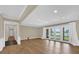 Spacious living room with wood floors and French doors to the back porch at 633 Balmoral Rd, Winter Park, FL 32789