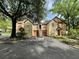 Beautiful townhome complex with private parking and mature landscaping providing shade and curb appeal at 6400 Raleigh St # 3015, Orlando, FL 32835