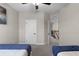 This spacious bedroom features plush carpeting, neutral walls, and a ceiling fan for added comfort at 7745 Somersworth Dr, Kissimmee, FL 34747