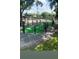 Outdoor mini golf with well-maintained greens and charming decorative features at 7745 Somersworth Dr, Kissimmee, FL 34747