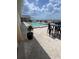 Relaxing rooftop pool with tables and chairs offering stunning views of the surrounding area at 7745 Somersworth Dr, Kissimmee, FL 34747