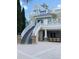 Finns Restaurant exterior with stairs and signage, inviting guests for a premier dining experience at 7745 Somersworth Dr, Kissimmee, FL 34747