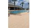 A bright and inviting swimming pool with a tile pool deck for relaxation and enjoyment at 7745 Somersworth Dr, Kissimmee, FL 34747
