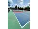 Community tennis court ready for a friendly match at 7745 Somersworth Dr, Kissimmee, FL 34747
