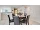 Cozy dining area with seating for six, great for Gathering meals and gatherings at 8989 Rhodes St, Kissimmee, FL 34747