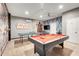 Fun game room with Star Wars decor, a pool table, and a ping pong table, perfect for entertainment at 8989 Rhodes St, Kissimmee, FL 34747
