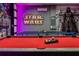 Large game room boasts Star Wars theme, pool table, and ping pong at 8989 Rhodes St, Kissimmee, FL 34747