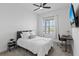 Bright bedroom with a comfortable bed, workspace, and view, perfect for work or relaxation at 14189 Larkspur Lake Dr, Winter Garden, FL 34787