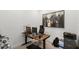 Functional home office space featuring a modern desk, ergonomic chair, and ample natural light at 14189 Larkspur Lake Dr, Winter Garden, FL 34787