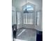 Bright dining area with tile flooring, natural light, and modern pendant lighting at 11714 Peachstone Ln, Orlando, FL 32821