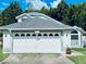 A well maintained single Gathering house with a two car garage and nice landscaping at 11714 Peachstone Ln, Orlando, FL 32821