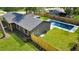 Aerial view of the home showcasing the backyard with a private pool and fenced yard at 1201 Manchester Rd, Maitland, FL 32751