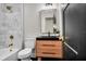 Stylish bathroom featuring marble tile, a modern vanity, and updated fixtures at 1201 Manchester Rd, Maitland, FL 32751