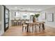 Bright kitchen with a breakfast bar, pendant lighting, and an inviting dining table setup at 1201 Manchester Rd, Maitland, FL 32751
