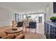 Beautifully staged living room showcasing the home's open layout, hardwood floors and modern lighting at 1201 Manchester Rd, Maitland, FL 32751