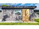 Side view of a home's outdoor shower and exterior at 1201 Manchester Rd, Maitland, FL 32751