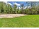 Large backyard featuring a blank space that can be customized with your creative landscape ideas at 13101 Sw 85 Pl, Dunnellon, FL 34432