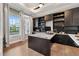 Beautiful home office featuring custom built-ins, spacious desk, and large window at 13137 Lower Harden Ave, Orlando, FL 32827