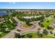 Panoramic aerial view of the community showcasing homes, landscaping, and roundabout at 14285 United Colonies Dr, Winter Garden, FL 34787