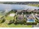 An aerial community shot shows beautiful homes, ponds, and well-manicured green spaces at 14285 United Colonies Dr, Winter Garden, FL 34787