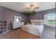 Stylish bedroom with decor, water view, and complemented by modern furniture at 14285 United Colonies Dr, Winter Garden, FL 34787
