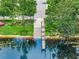 Aerial view of community boat ramp offering easy access to the lake with a wooden dock at 14285 United Colonies Dr, Winter Garden, FL 34787
