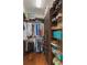 Organized walk-in closet with shelves, drawers, and hanging rods for efficient storage at 14285 United Colonies Dr, Winter Garden, FL 34787
