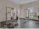 Well-equipped community fitness center featuring modern exercise machines and natural light at 14285 United Colonies Dr, Winter Garden, FL 34787