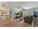 Cozy living room area with comfortable seating, a ceiling fan, and plenty of natural light at 14285 United Colonies Dr, Winter Garden, FL 34787