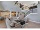 Open concept living room with staircase and views of the kitchen in a well-lit home at 14285 United Colonies Dr, Winter Garden, FL 34787