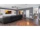 Open-concept living room with views of dining area and staircase to the second floor at 14285 United Colonies Dr, Winter Garden, FL 34787