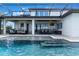 Beautiful swimming pool and seating area are covered by a screen enclosure, creating a relaxing outdoor retreat at 14285 United Colonies Dr, Winter Garden, FL 34787