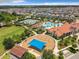 Aerial view of community amenities including pool, park, and tennis courts at 14639 Winter Stay Dr, Winter Garden, FL 34787