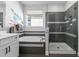 Modern bathroom features a sleek glass-enclosed shower, tub, and stylish tile work for a spa-like experience at 14639 Winter Stay Dr, Winter Garden, FL 34787
