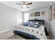 Cozy bedroom featuring a ceiling fan and whimsical decor, creating a playful and inviting space at 14639 Winter Stay Dr, Winter Garden, FL 34787