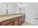 Bathroom featuring granite countertops and double sinks at 14706 Driftwater Dr, Winter Garden, FL 34787