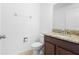 Half bath with granite countertop and toilet at 14706 Driftwater Dr, Winter Garden, FL 34787