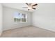 Bedroom with carpet and a window at 14706 Driftwater Dr, Winter Garden, FL 34787
