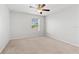 Bedroom with carpet and a window at 14706 Driftwater Dr, Winter Garden, FL 34787