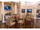An elegant clubhouse featuring stylish furniture, artwork, and a large-screen TV for relaxation and entertainment at 14706 Driftwater Dr, Winter Garden, FL 34787