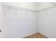 Spacious walk-in closet with wire shelving and ample storage space at 14706 Driftwater Dr, Winter Garden, FL 34787