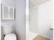 Bathroom featuring a toilet, shower stall and vanity at 1511 New York Ave, St Cloud, FL 34769