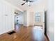 Bright living room featuring hardwood flooring, neutral walls, and a window offering natural light at 1511 New York Ave, St Cloud, FL 34769
