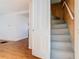 View of the white stairway going up to the next level in the house at 1511 New York Ave, St Cloud, FL 34769