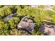 Gorgeous aerial shot of the backyard and surrounding trees on a bright day at 162 Seville Chase Dr, Winter Springs, FL 32708
