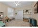 Bedroom featuring built-in shelving, storage, and a window with shutters at 162 Seville Chase Dr, Winter Springs, FL 32708
