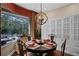 Formal dining area with large window and natural light at 162 Seville Chase Dr, Winter Springs, FL 32708