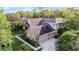 Stunning two-story home featuring stone accents, lush landscaping, and an attached two-car garage at 162 Seville Chase Dr, Winter Springs, FL 32708